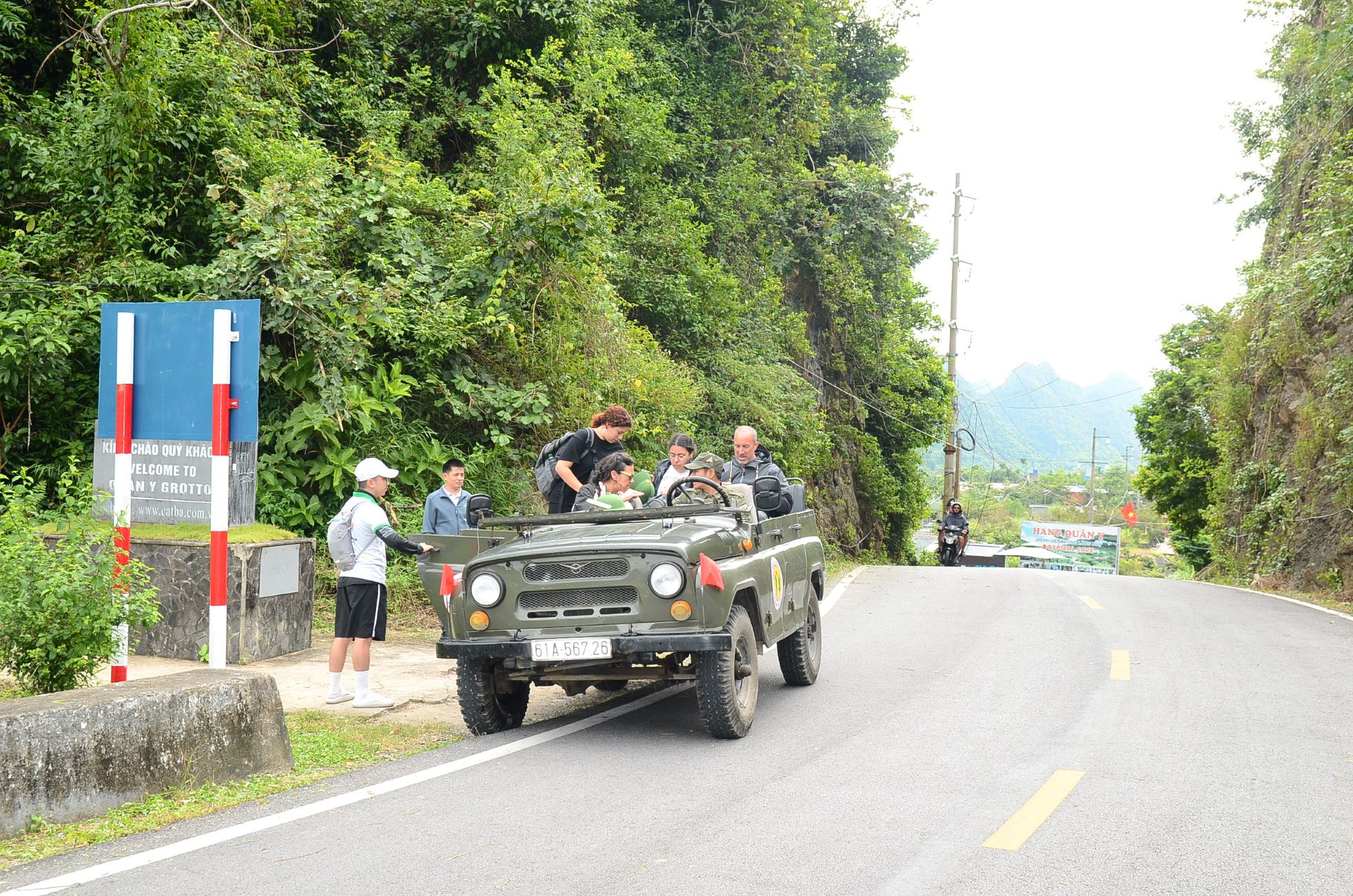 Cat Ba Riding on Vintage US Army Jeep Car